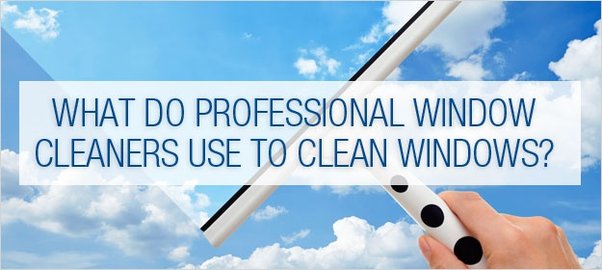 What tools do professional window cleaners use?